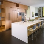 View of kitchen with white breakfast bar and architecture, countertop, floor, flooring, interior design, kitchen, real estate, table, gray