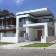 View of contemporary white home. - View of architecture, building, commercial building, elevation, facade, home, house, official residence, property, real estate, residential area, sky, villa, gray, blue