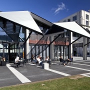 View of folded roof and canopy design at architecture, building, city, commercial building, corporate headquarters, mixed use, residential area, structure, urban design, gray