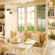 View of remodeled kitchen in a California bungalow, dining room, furniture, home, interior design, living room, room, table, window, orange