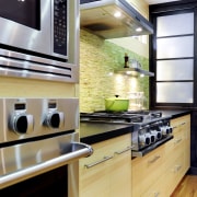 View of kitchen and dining area with Japanese cabinetry, countertop, interior design, kitchen, under cabinet lighting, gray