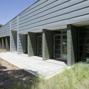 Exterior view of the National Centre for Social architecture, corporate headquarters, facade, home, house, real estate, siding, structure, window, black, gray