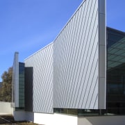 Exterior view of the National Centre for Social architecture, building, commercial building, corporate headquarters, daylighting, daytime, facade, headquarters, house, roof, sky, structure, window, gray, blue