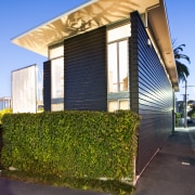 Exterior  view of renovated home with black architecture, building, facade, home, house, neighbourhood, property, real estate, residential area, sky