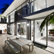 View of renovated home with black and white apartment, architecture, condominium, estate, home, house, interior design, property, real estate, white