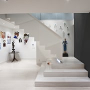 View of renovated home with black and white exhibition, floor, flooring, interior design, product design, gray