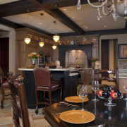 View of kitchen with aged look, featuring internally ceiling, countertop, dining room, interior design, restaurant, room, table, black, brown