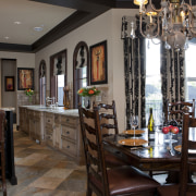 View of kitchen with aged look, featuring internally dining room, furniture, interior design, restaurant, room, black, gray