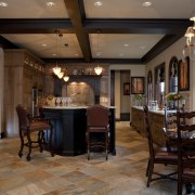 View of kitchen with aged look, featuring internally ceiling, dining room, flooring, interior design, restaurant, brown