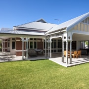 Outdoor view of home and surrounding area. - cottage, elevation, estate, facade, farmhouse, home, house, orangery, property, real estate, villa, window, teal