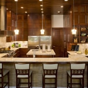 12-ft ceilings. Sandstone floors. Sapele wood cabinetry. Three dining room, furniture, interior design, kitchen, table, brown, red