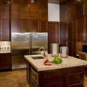 12-ft ceilings. Sandstone floors. Sapele wood cabinetry. Three cabinetry, countertop, cuisine classique, interior design, kitchen, room, red, brown