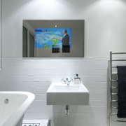 View of white bathroom and waterproof LCD television bathroom, bathroom accessory, home, interior design, product design, room, sink, gray