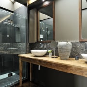 View of contemporary bathroom with dark walls. - bathroom, countertop, interior design, room, sink, black