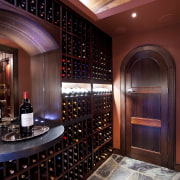 View of wine rack and stone flooring. - ceiling, interior design, lobby, wine cellar, winery, red, black