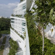 View of Solaris, an ecoskyscraper designed by Ken architecture, building, condominium, outdoor structure, plant, tree, brown, gray