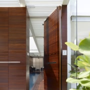 This house, designed by Han Loke Kwang of architecture, door, facade, house, interior design, wood, white