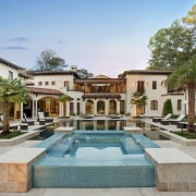 View of traditional home and pool area. - courtyard, estate, hacienda, home, hotel, mansion, property, real estate, resort, swimming pool, villa, gray