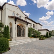 View of traditional home. - View of traditional building, estate, facade, hacienda, home, house, mansion, property, real estate, residential area, villa, gray