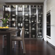 View of the BeauxArts.02 collection by SieMatic, including floor, flooring, hardwood, interior design, laminate flooring, lobby, window, wood, wood flooring, black