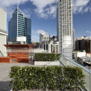 View of outdoor area with Inscape plants. - apartment, architecture, building, city, cityscape, commercial building, condominium, corporate headquarters, daytime, downtown, headquarters, metropolis, metropolitan area, mixed use, real estate, reflection, residential area, sky, skyline, skyscraper, tower block, urban area, urban design, gray