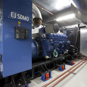 View of Britomart East project, for which Norman engineering, factory, industry, locomotive, machine, manufacturing, public transport, railroad car, rapid transit, rolling stock, transport, blue