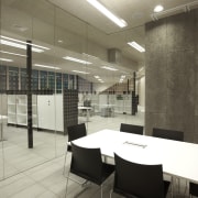 View of DOC building with neutral toned interior architecture, ceiling, daylighting, floor, flooring, interior design, lobby, real estate, wall, brown, black, white