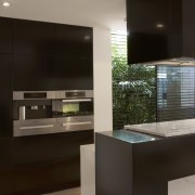 The kitchen designed by Michael Kilkeary of Embark, architecture, cabinetry, countertop, furniture, interior design, kitchen, black