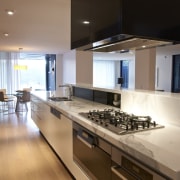 Kitchen designed by Michael Kilkeary, featuring appliances from countertop, interior design, kitchen, brown