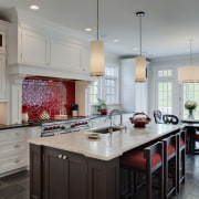 Arched openings. Red splash back. Limestone floors. White cabinetry, countertop, cuisine classique, interior design, kitchen, room, gray