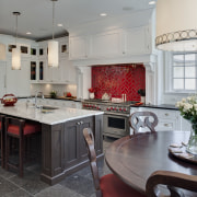 Arched openings. Red splash back. Limestone floors. White cabinetry, countertop, cuisine classique, interior design, kitchen, room, gray
