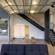 View of stairway down to lounge. - View architecture, ceiling, daylighting, house, interior design, loft, real estate, gray