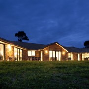 Exterior night shot of house. - Exterior night architecture, cloud, cottage, estate, evening, facade, farmhouse, home, house, landscape, landscape lighting, lighting, night, property, real estate, residential area, roof, sky, suburb, sunlight, blue