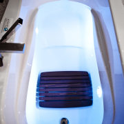 View of contemporary bathroom with dark cabinets - automotive design, automotive exterior, blue, motor vehicle, product, product design, technology, gray, white