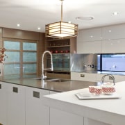 Wood floors. Natural tones. Japanese inspiration. Remodelled kitchen. cabinetry, countertop, cuisine classique, interior design, kitchen, real estate, gray