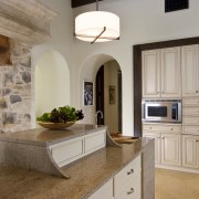 Stone chimney. Italianate villa. Kitchen at one end cabinetry, countertop, cuisine classique, floor, flooring, home, home appliance, interior design, kitchen, room, gray, brown