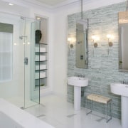 This bathroom, designed by Jamie Drake of Drake bathroom, floor, home, interior design, plumbing fixture, room, tile, gray