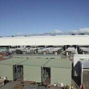 View of building by Hutchinson Builders. - View atmosphere of earth, roof, sky, gray