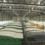 View of building by Hutchinson Builders. - View factory, leisure centre, structure, gray, black