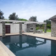 This is a pool landscape designed by Mark backyard, estate, home, house, leisure, outdoor structure, property, real estate, swimming pool, villa, teal, gray