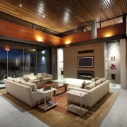 This house was designed by architect Martin Grounds ceiling, estate, interior design, living room, real estate, room, brown
