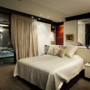This house was designed by architect Martin Grounds bedroom, ceiling, hotel, interior design, room, suite, brown