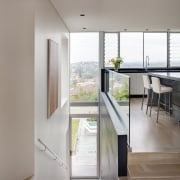 This house was designed by Andy MacDonald with architecture, floor, house, interior design, gray