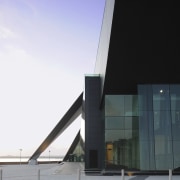 View of the exterior of the Albany Entertainment architecture, building, corporate headquarters, facade, fixed link, sky, white, black