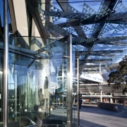 View of the entrance of the Novotel Auckland architecture, building, facade, headquarters, metropolis, metropolitan area, mixed use, reflection, structure, tourist attraction, black, blue