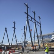 Novotel Auckland Airport by Gorge Grant Engineering. fixed link, mast, port, sailing ship, ship, sky, structure, tall ship, wind, teal