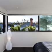 This new house was designed by Richard Furze house, interior design, property, real estate, room, window, gray