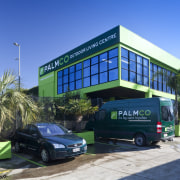 Palmco Building. - Palmco Building. - building | building, car, commercial building, corporate headquarters, motor vehicle, property, real estate, transport, vehicle, blue, teal