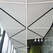 Interior of the Novotel Auckland Airport, by Sharp architecture, ceiling, daylighting, facade, glass, house, line, roof, structure, gray