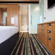 Interior of the Novotel Auckland Airport. Carpets supplied architecture, ceiling, floor, flooring, interior design, room, wood, wood flooring, gray, black